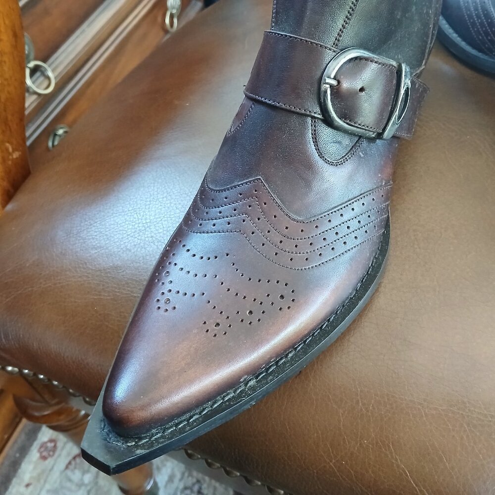 Exquisite pair of mens cowboy boots. Leather. New and unworn.